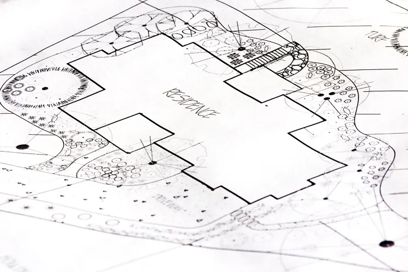 Hand-drawn landscape design plan for a residential lot